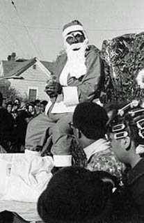 Black Santa Clause on the parade float. Photo courtesy of Durham Herald Sun